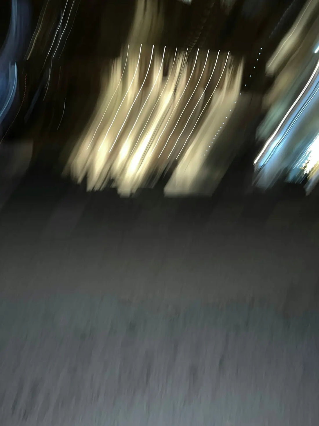a blurry photo of a person riding a skateboard