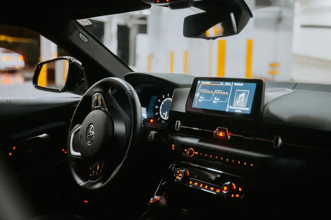 The dashboard of a car with a digital screen