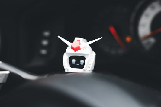 A close up of a car dashboard with a speedometer