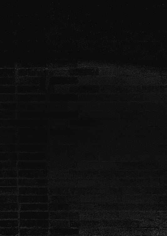 A black and white photo of a person on a skateboard