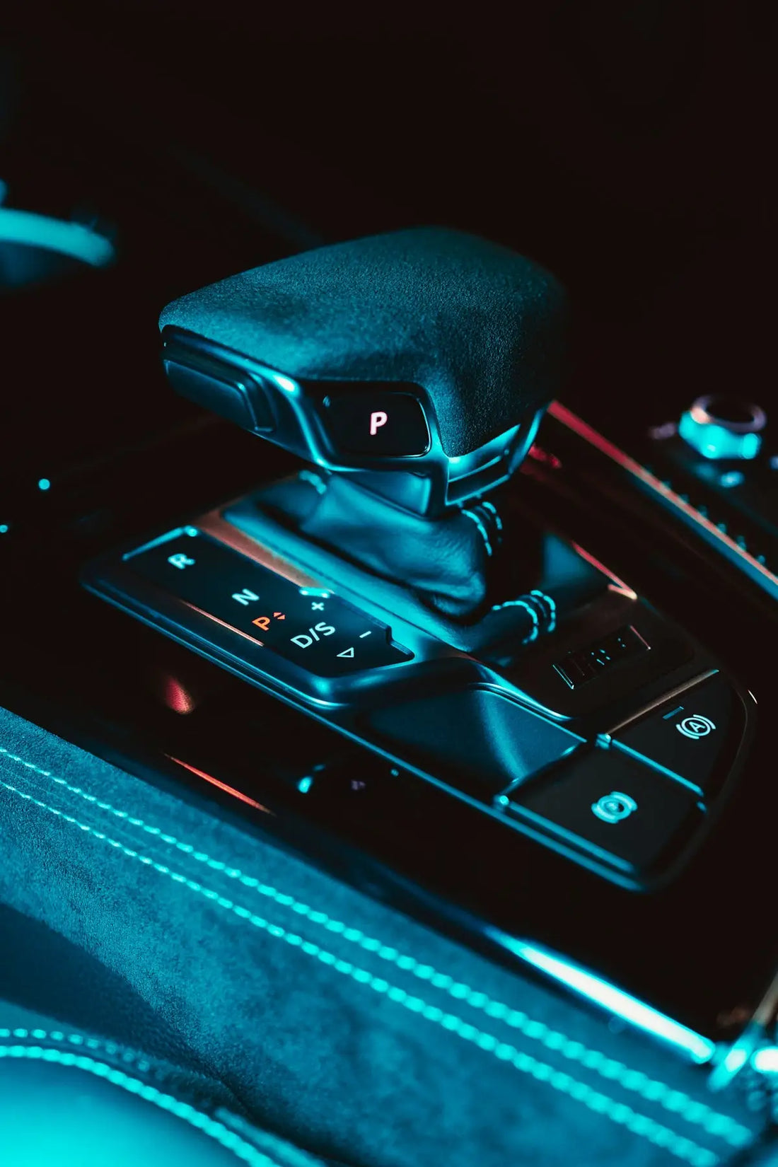 a close up of a car's gear box