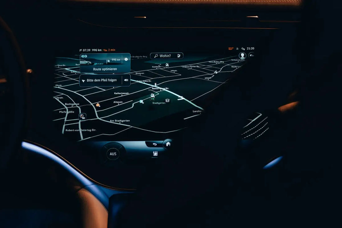the dashboard of a car with a map on it