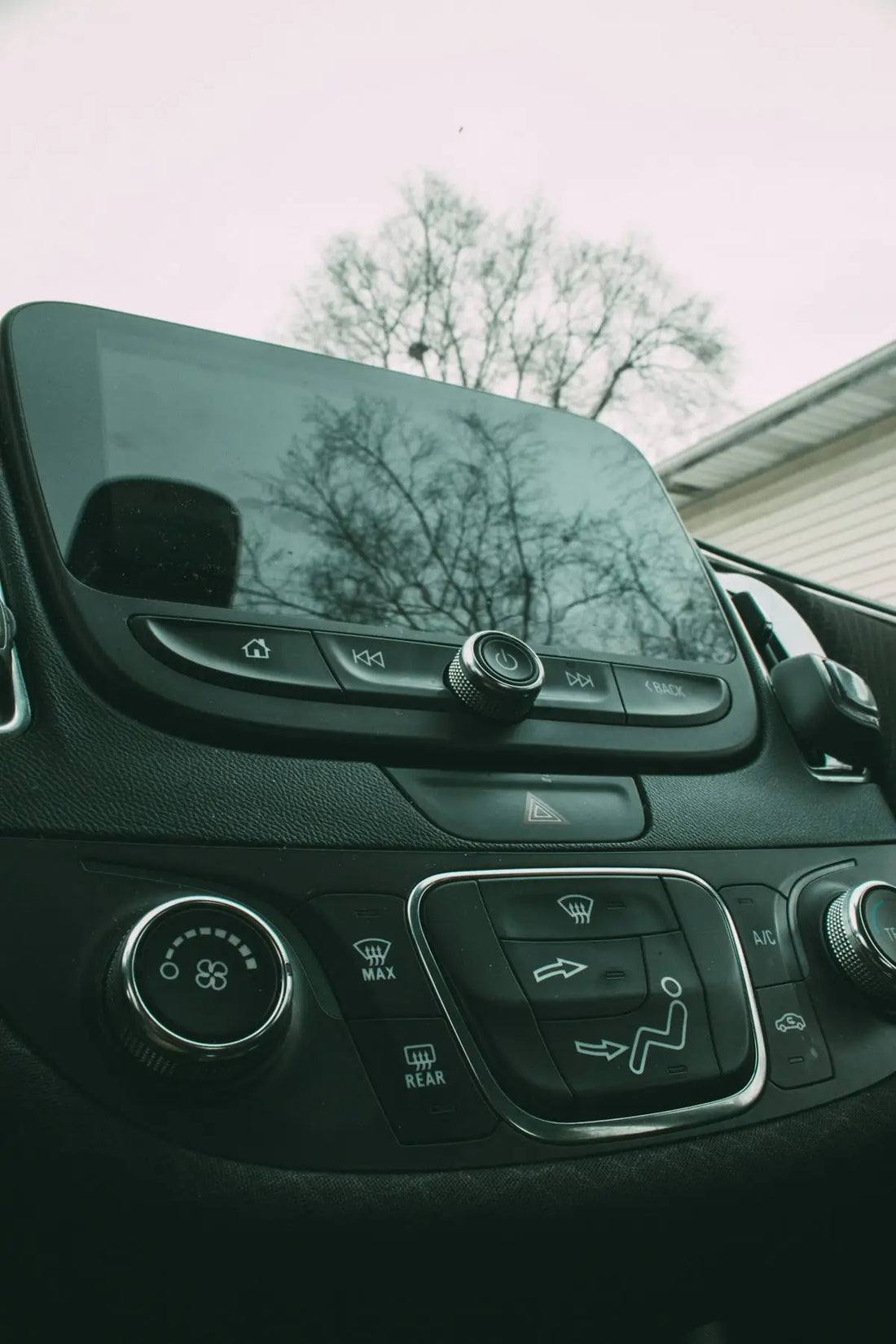 the dashboard of a car with a clock on it