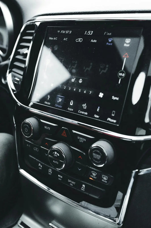 a close up of a radio in a car