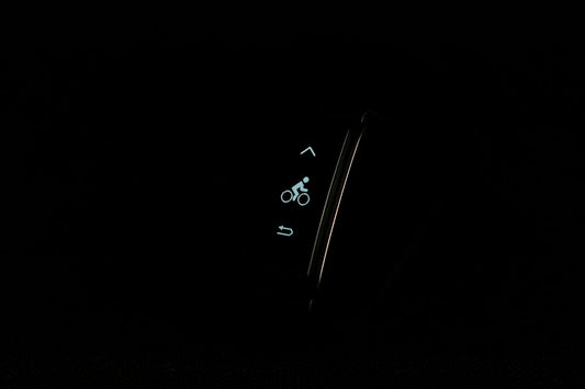 a close up of a cell phone in the dark