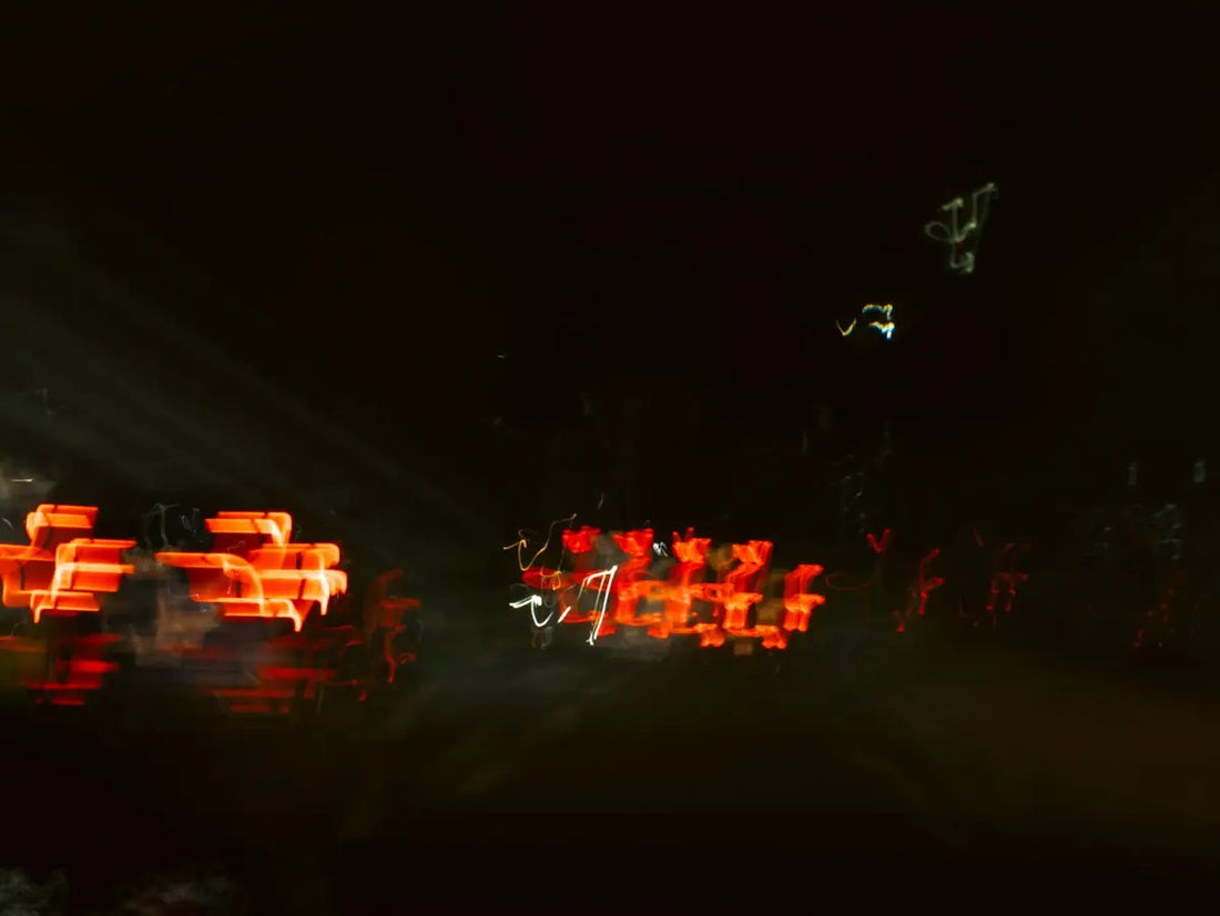 Abstract streaks of red light at night