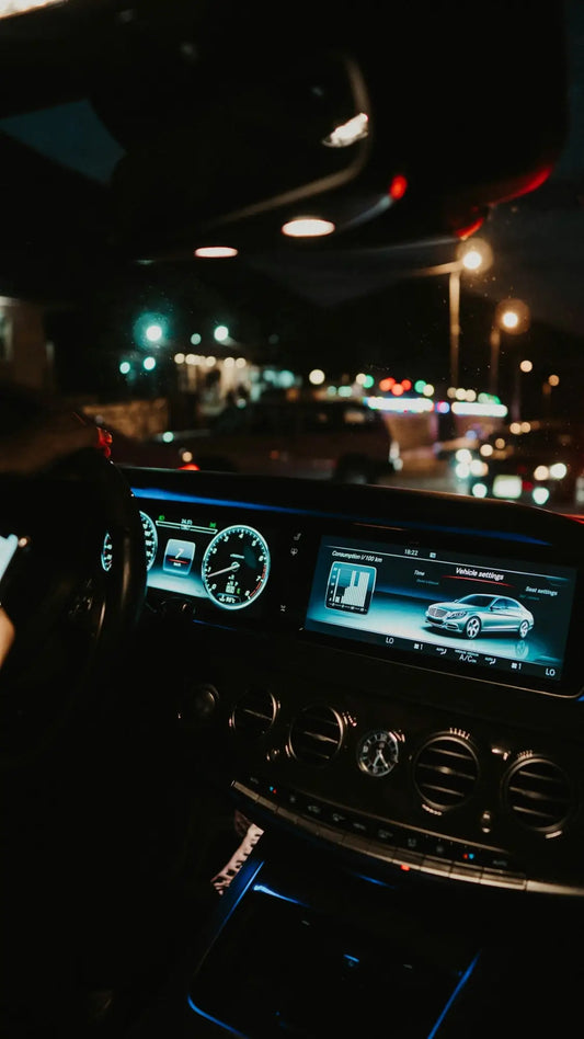 person driving car during night time