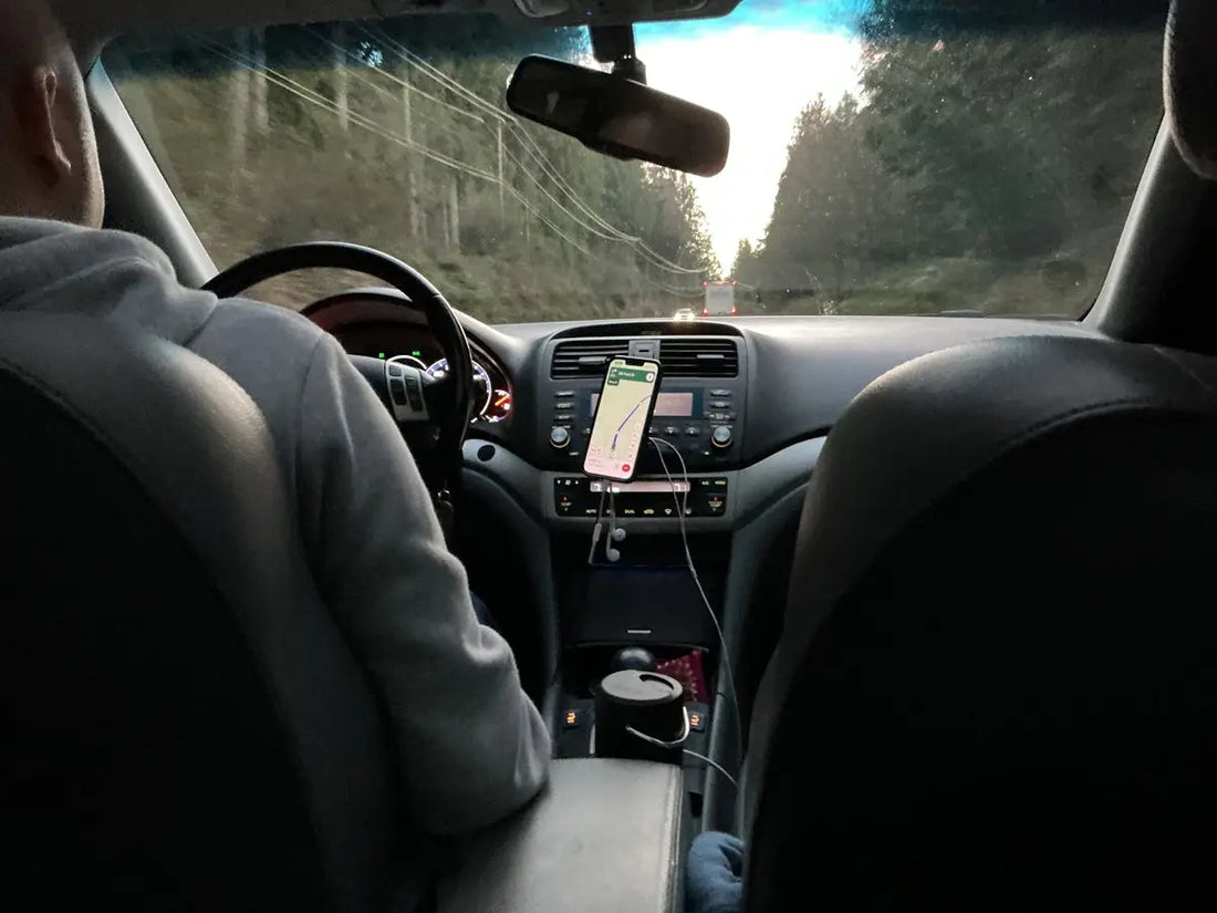 Driving on a road through trees with trees