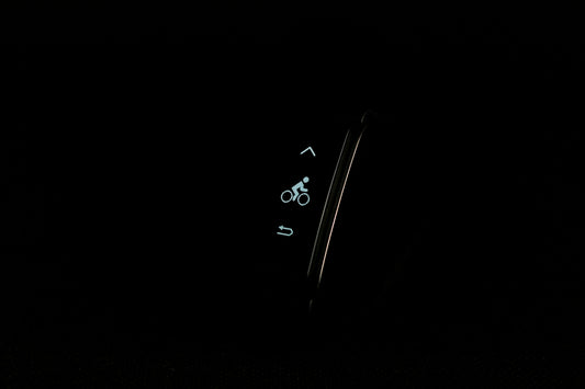 a close up of a cell phone in the dark