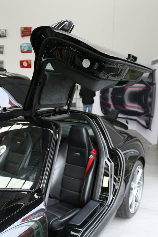 black car in a parking lot