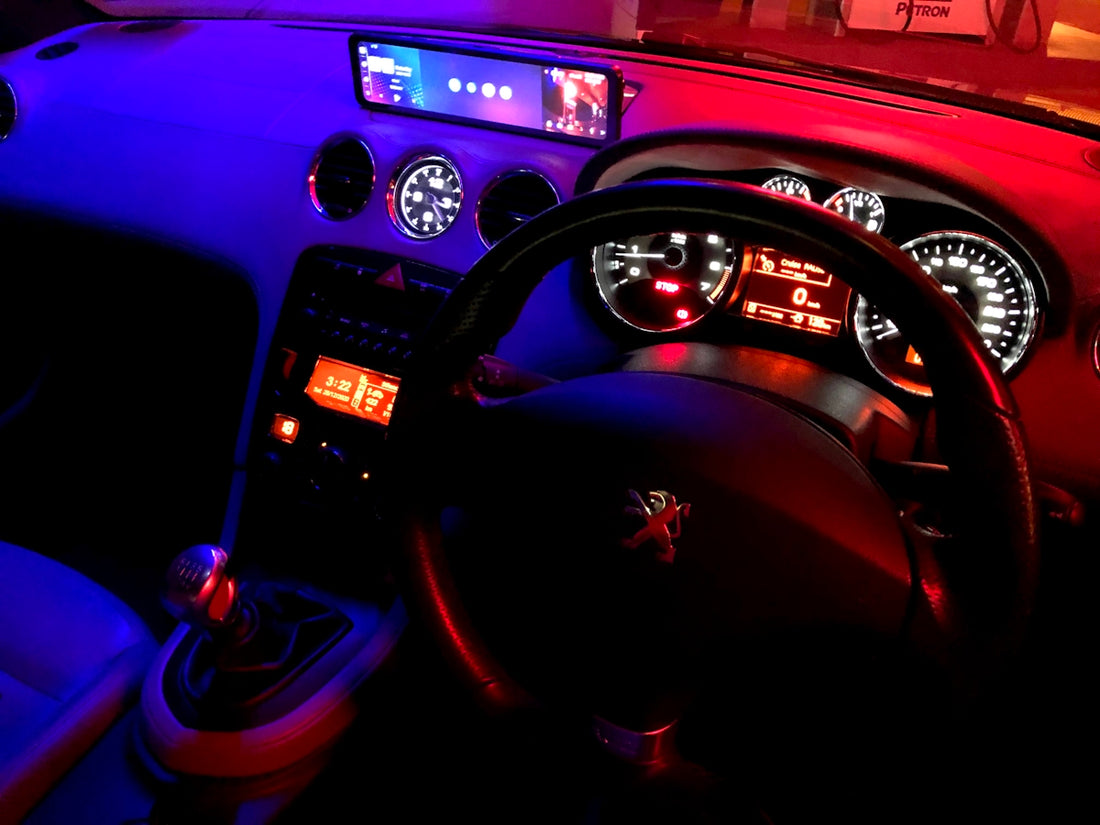 black and red car steering wheel