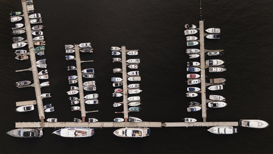 white and black cars on parking lot