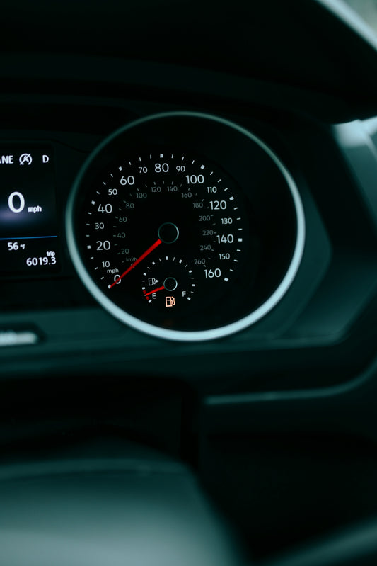 a close up of a speedometer in a vehicle