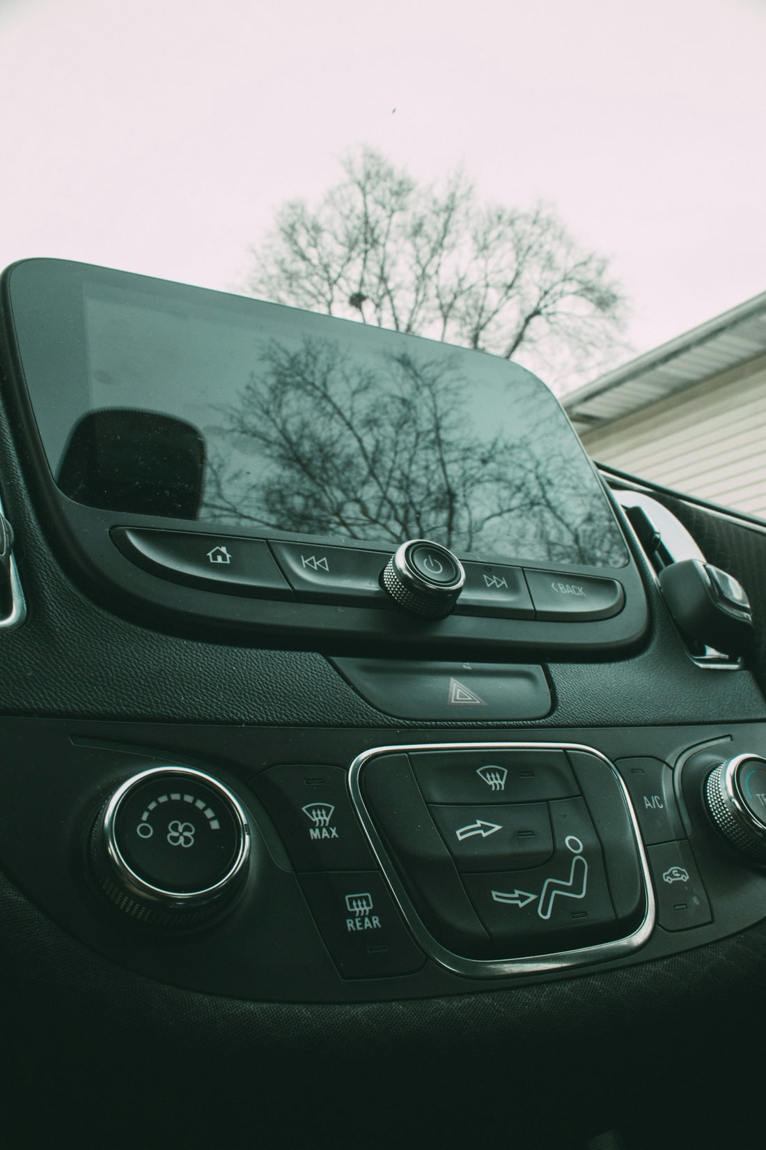 the dashboard of a car with a clock on it