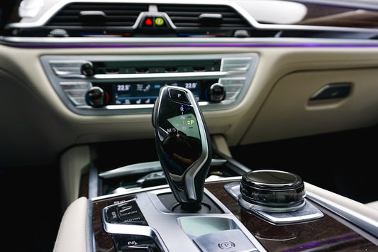 a car dashboard with a cell phone holder