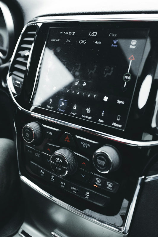 a close up of a radio in a car