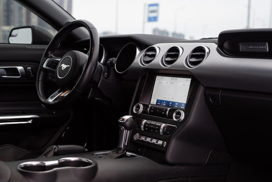 the interior of a car with a touch screen