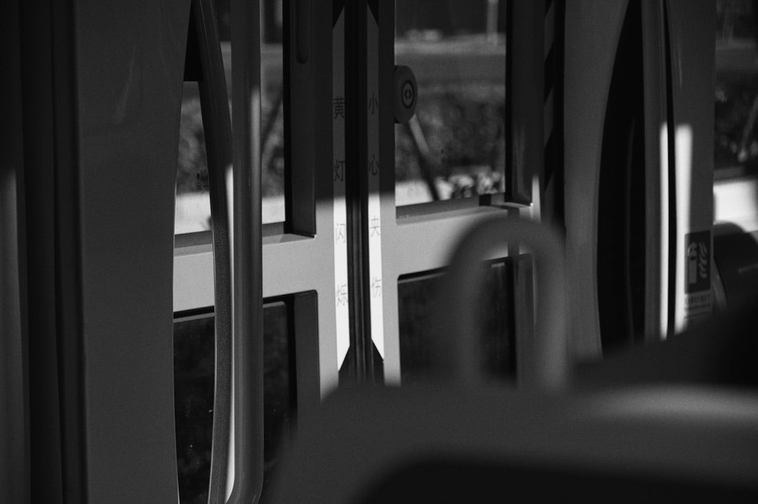 a black and white photo of the inside of a bus