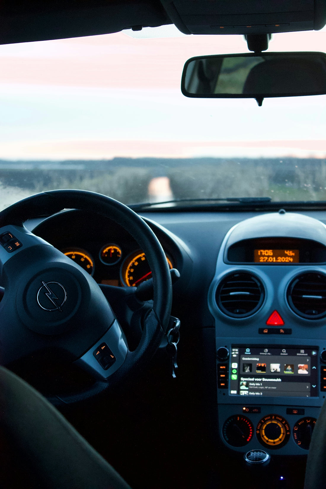 the dashboard of a car with a dash light on