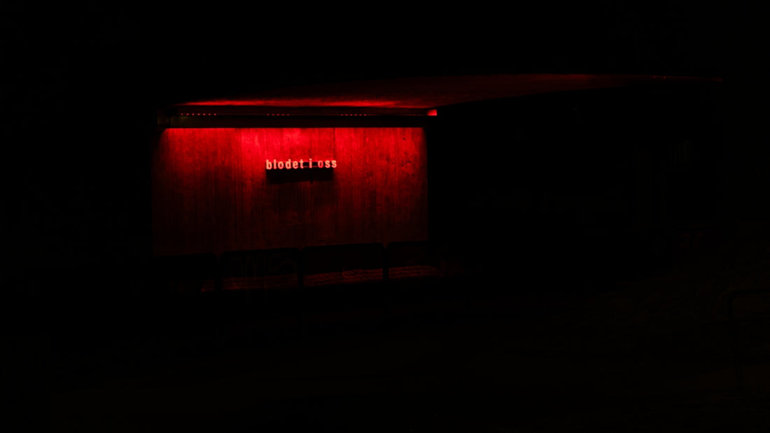 a dark room with a red light on it