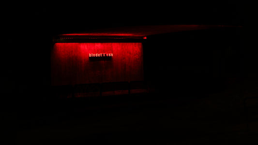 a dark room with a red light on it