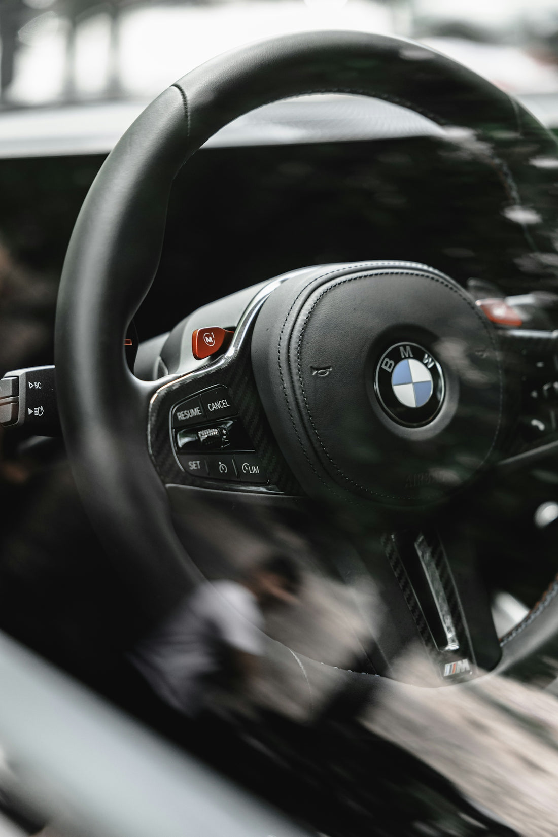 a close up of a steering wheel and dashboard of a car