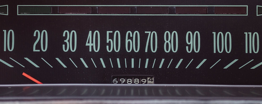 A close up of a speedometer on a vehicle