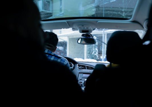 A view of the inside of a car from inside the vehicle