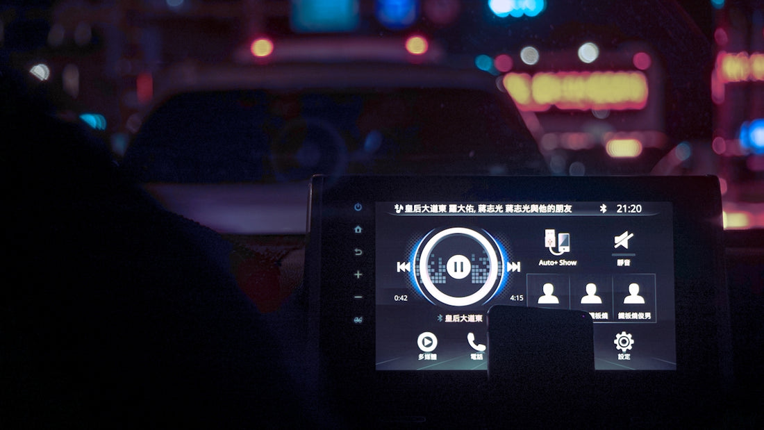 A dashboard of a car at night time