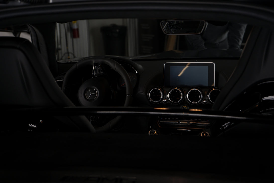 The dashboard of a car in the dark