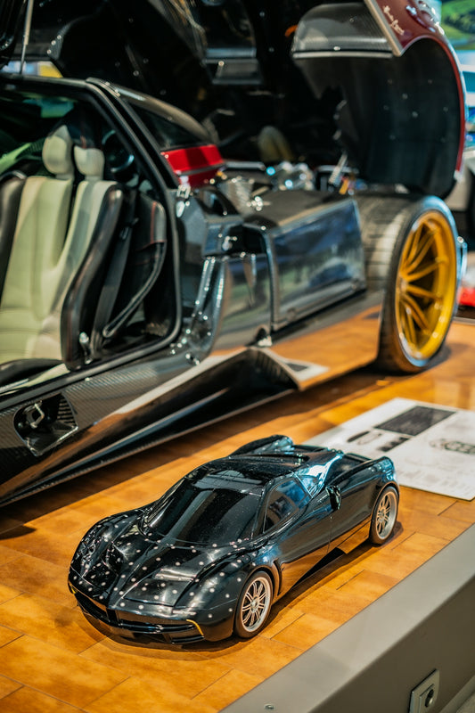 A toy car is on display in a showroom