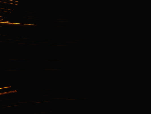 Streaks of light against a dark background