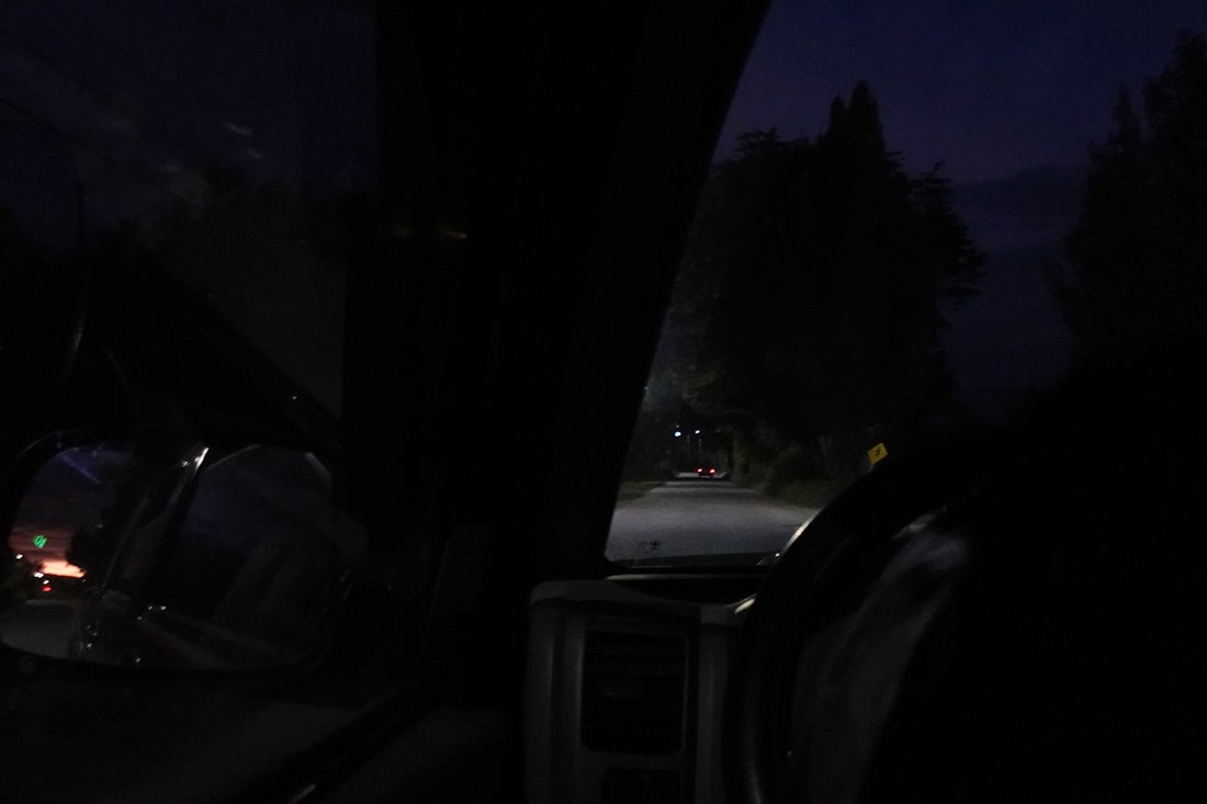 Driving on a dark road at night