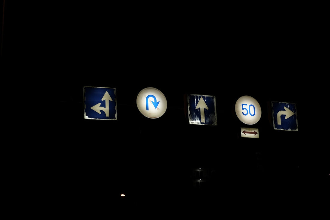 a group of signs that are on a wall