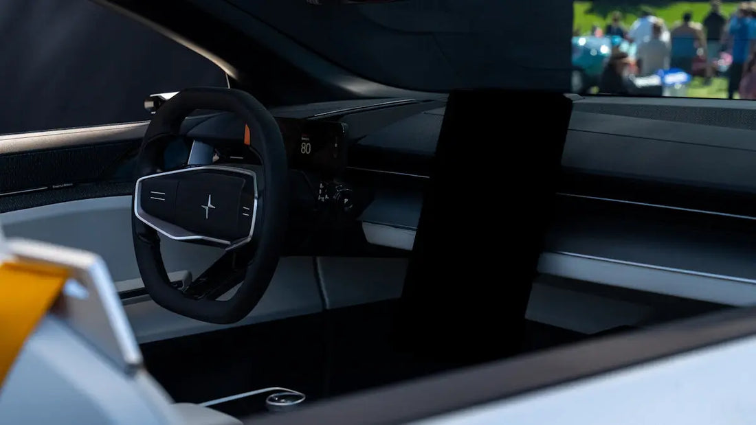 the interior of a car with a steering wheel