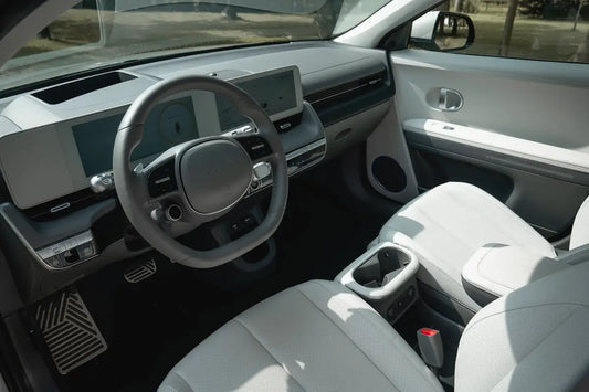 Modern car interior with digital dashboard and comfortable seats