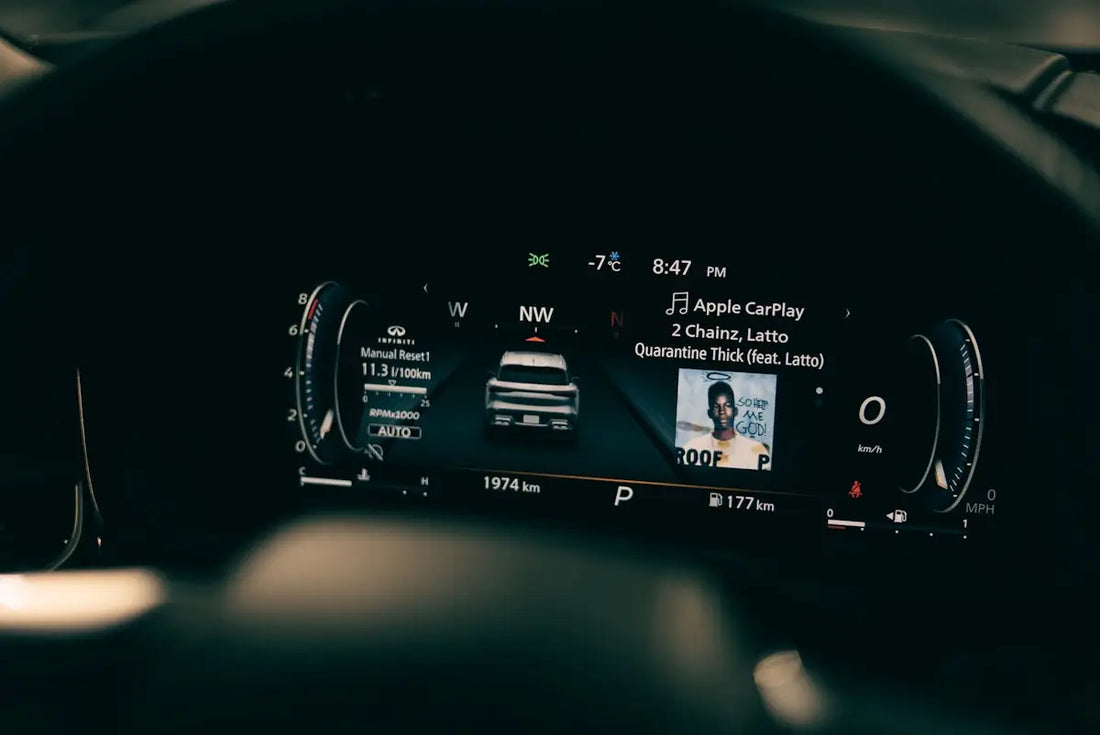the dashboard of a car with a picture of a man on it