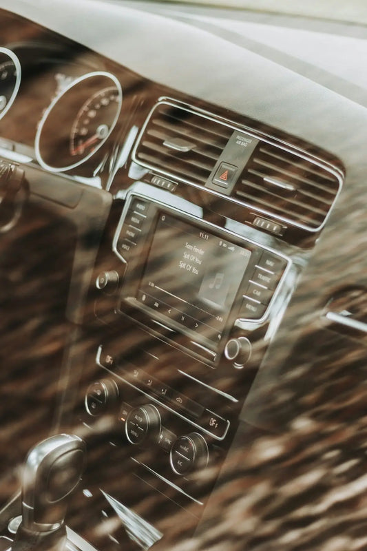 the dashboard of a car with a digital display