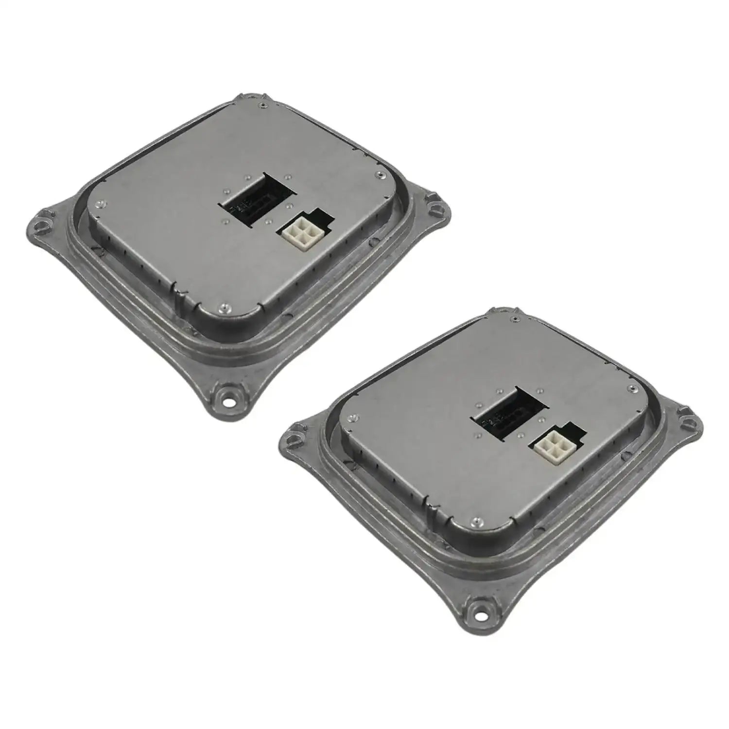 Dwa szare metalowe moduły sterowania reflektora z wbudowanymi złączami do bmw e90 e92 e93 i mini cooper