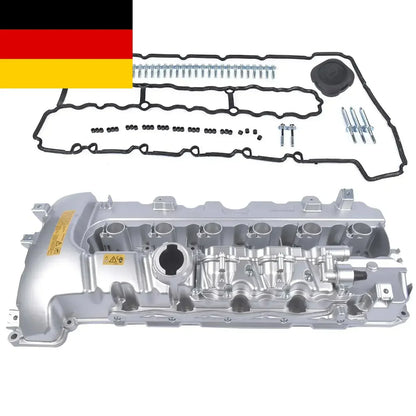 Srebrna aluminiowa pokrywa zaworu silnika turbo zintegrowanymi punktami montażowymi i etykietami ostrzegawczymi do bmw n54