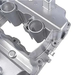 Srebrna aluminiowa pokrywa zaworu silnika turbo z precyzyjnie obrobionymi powierzchniami i otworami do śrub dla bmw n54