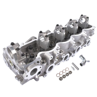 Srebrna aluminiowa głowica cylindra z czarnymi gumowymi uszczelkami i metalowymi śrubami do ford ranger mazda b-series md25ti