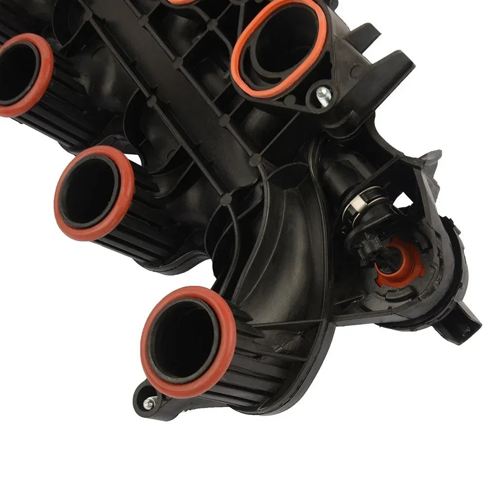 Czarny plastikowy kolektor dolotowy z pomarańczowymi gumowymi uszczelkami do land rover freelander 2 2.2 td4