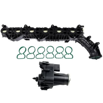Czarny plastikowy kolektor ssący ap03 z sześcioma zielonymi gumowymi uszczelkami i czarnym zespołem wtryskiwacza do bmw 530d xdrive gran turismo