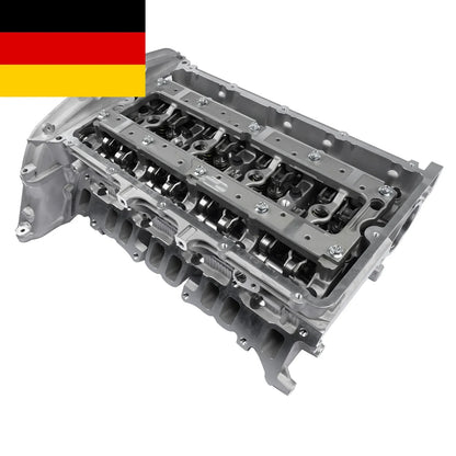 Srebrny metaliczny pełny cylinder head rmfb3q6c032aa z widocznymi zaworami i śrubami do ford transit ranger mk7 mk8
