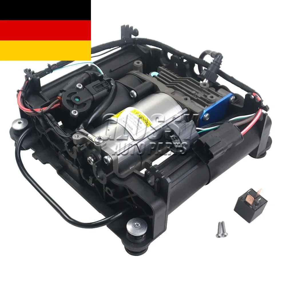 Czarna plastikowa obudowa z srebrną cylindryczną pompą i niebieskim złączem elektrycznym do range rover l322