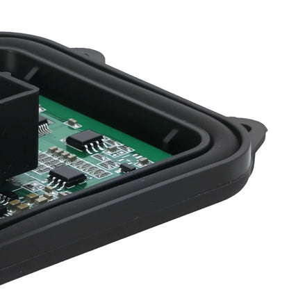 Czarne plastikowe obudowa modułu sterowania reflektora xenon bmw 328i coupe e92 z zieloną płytką elektroniczną