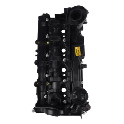 Czarna plastikowa pokrywa zaworów zintegrowanymi punktami mocowania i żółtą etykietą ostrzegawczą do n47 engine mini r55 r56 r57
