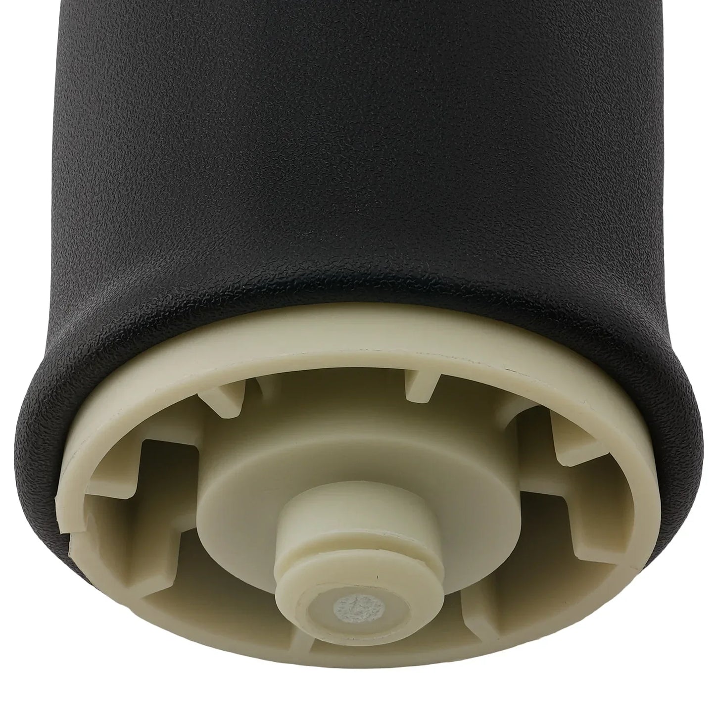Czarny gumowy cylindryczny element z beżową plastikową podstawą i gwintowanym trzpieniem do bmw x5 e53 sport pro powietrznych tylnych lewych