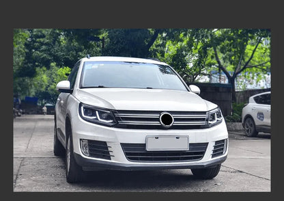 Lampy samochodowe do VW Tiguan (2013-2016) - Reflektory LED z soczewką projekcyjną, dzienne DRL, Oczkiem Anielskim (Angel Eye) i sygnałem - Multigenus